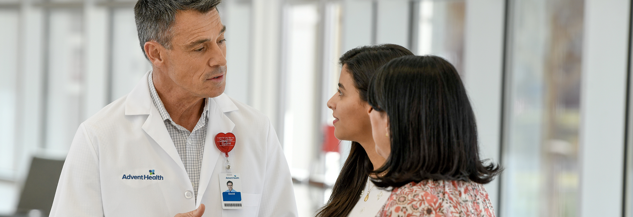 Doctor consulting with family